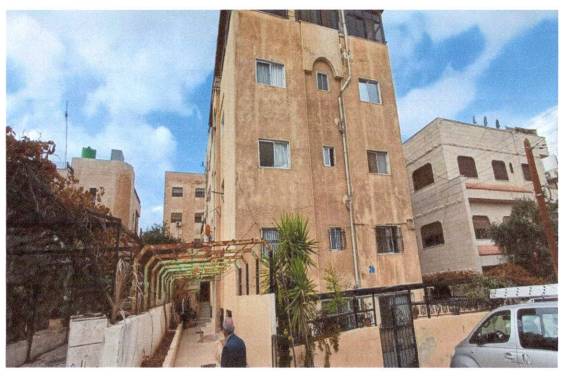 مزاد أرض / مجمع — الروضة